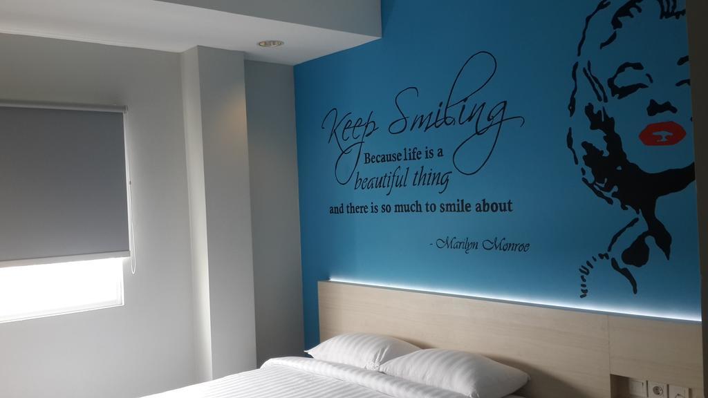 Summer Bed & Breakfast Banjarmasin  Δωμάτιο φωτογραφία